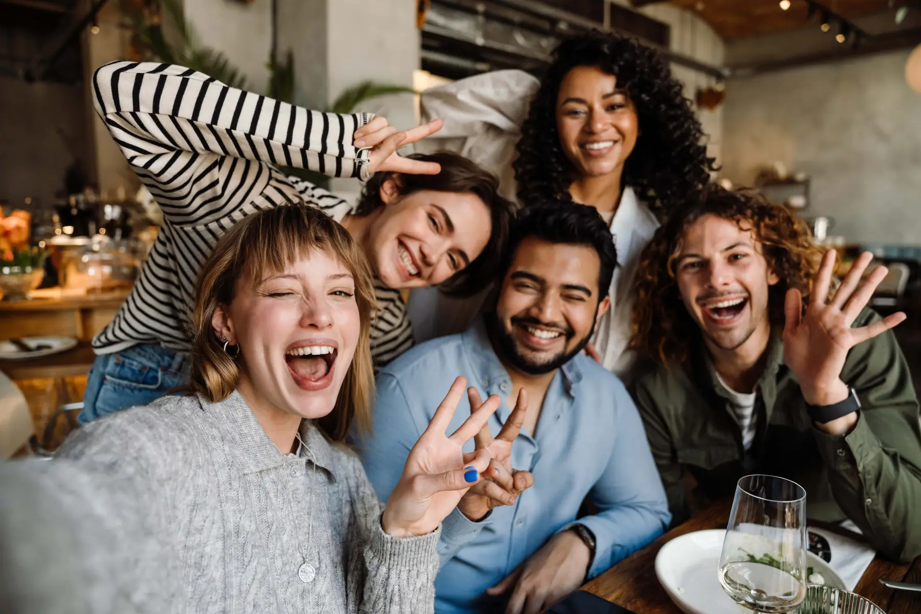 A group of friends together, laughing.